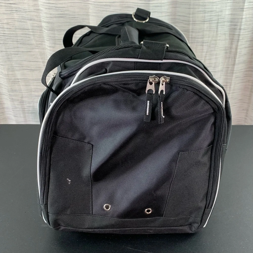 A Black 100th Anniversary Duffel Bag (Masonic?).